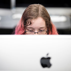 Student studying on computer at Anoka Technical College